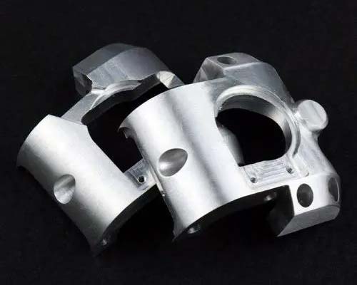 How does the choice of material for medical device forgings affect its performance?